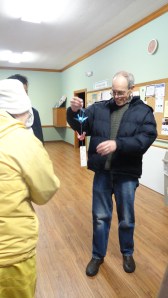 Sr. Clare offers peace cranes to Pastor Atwater